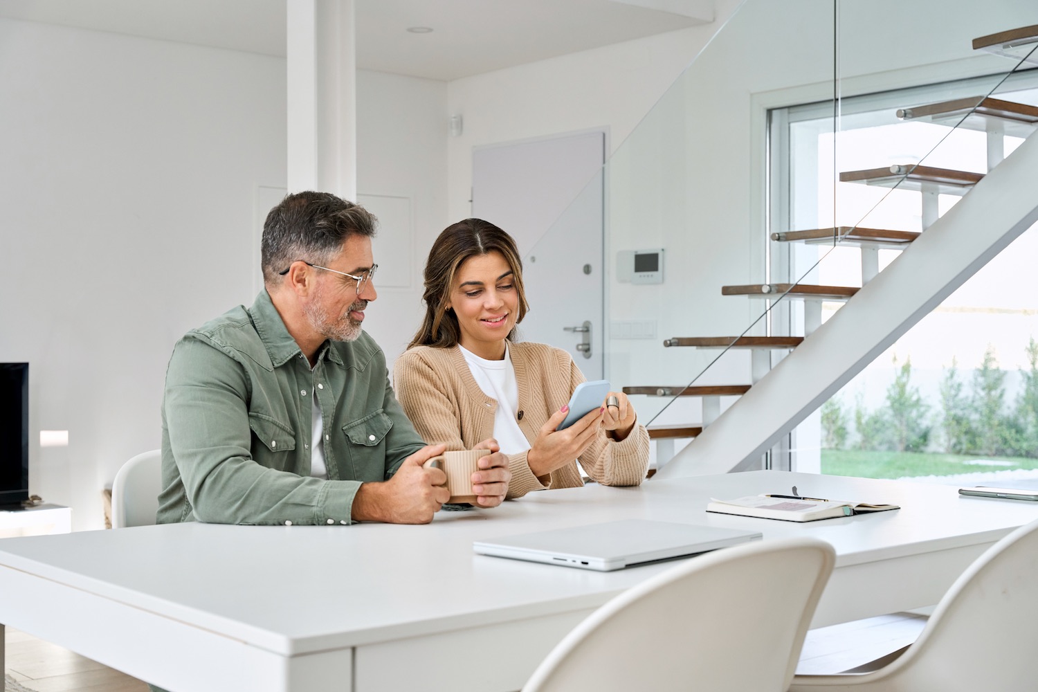 a couple reviewing their utility bills